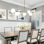 Load image into Gallery viewer, Gold Globo di vetro Chandelier - 7 globes
