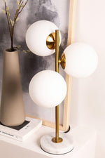 Load image into Gallery viewer, Gold Globo di vetro table lamp - 3 globes