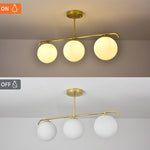 Load image into Gallery viewer, Gold Globo di vetro Chandelier - 3 globes
