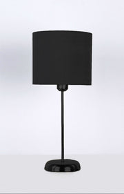 Black table lamp with a round shade on a white background