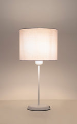 Load image into Gallery viewer, Table lamp with a beige fabric shade on a neutral background
