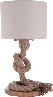 A beige table lamp with a unique design featuring a jute and linen fabric shade and a twine-like cord.
