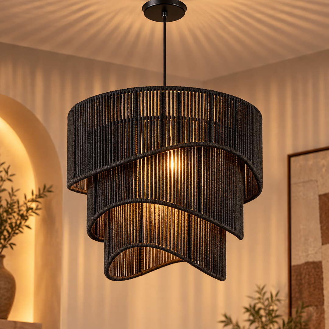 Black cascading rope chandelier with warm lighting
