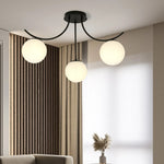 Load image into Gallery viewer, Black turned Globo di vetro Chandelier - 3 globes
